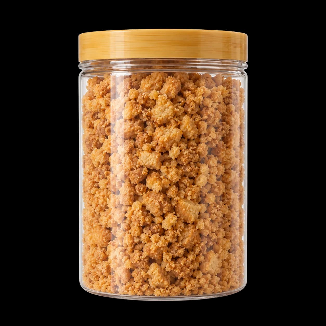 Glass jar of golden caramel flavor cookie crumbs with a bamboo lid