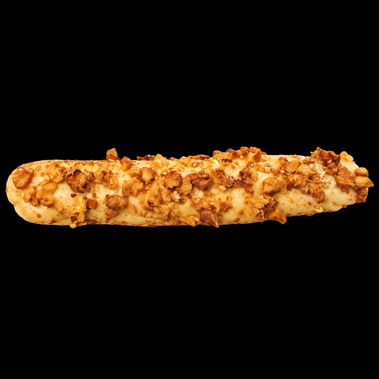Unbaked walnut Mario dough log covered with chopped walnuts