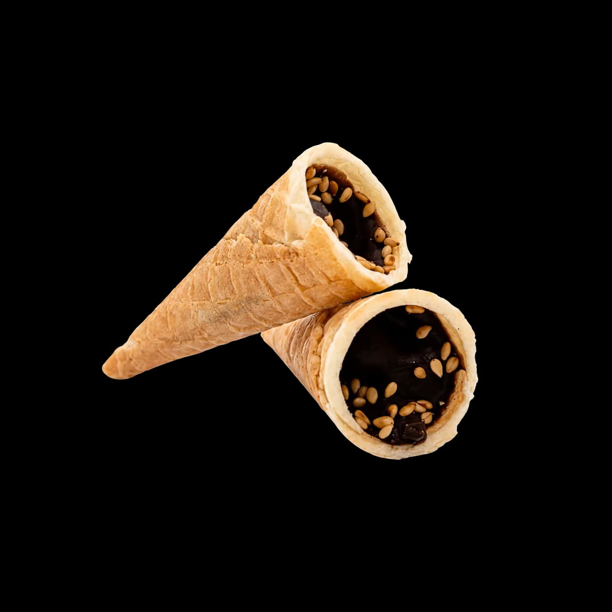 Dip Crunch mini waffle cone samples with chocolate filling and sesame topping